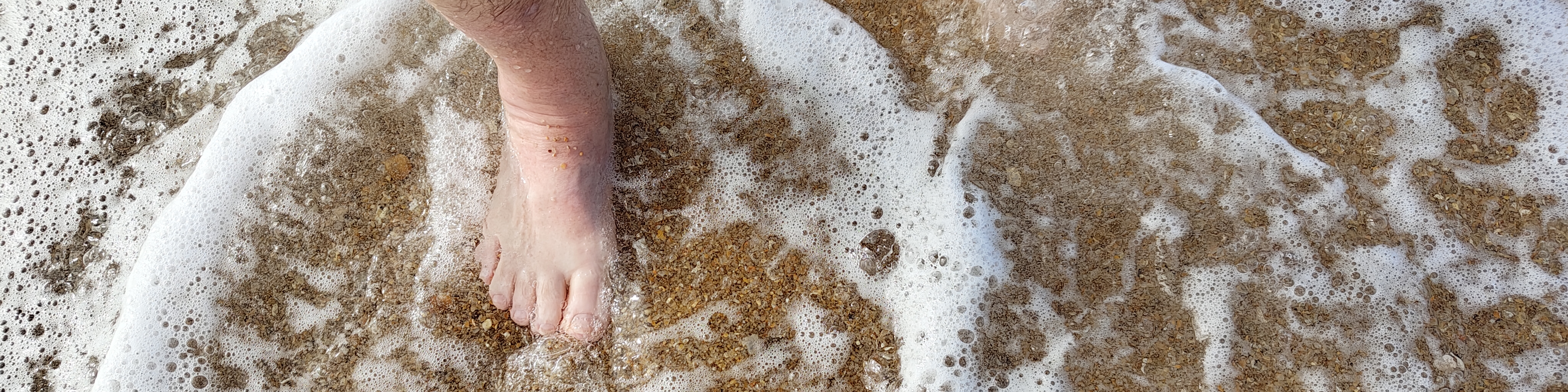 ja ich war mit den Füssen im Wasser